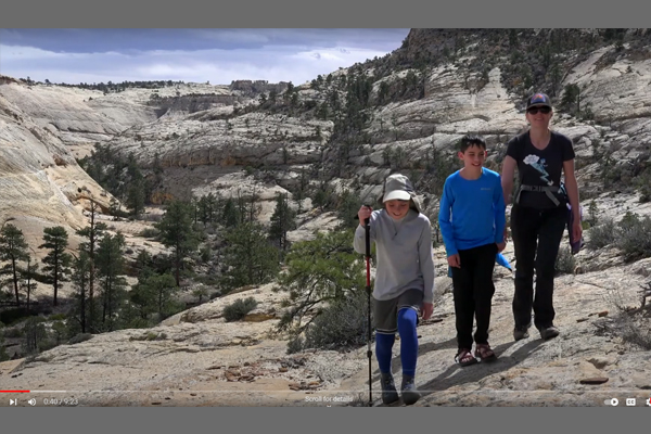 Kids stop for a break while on a hike